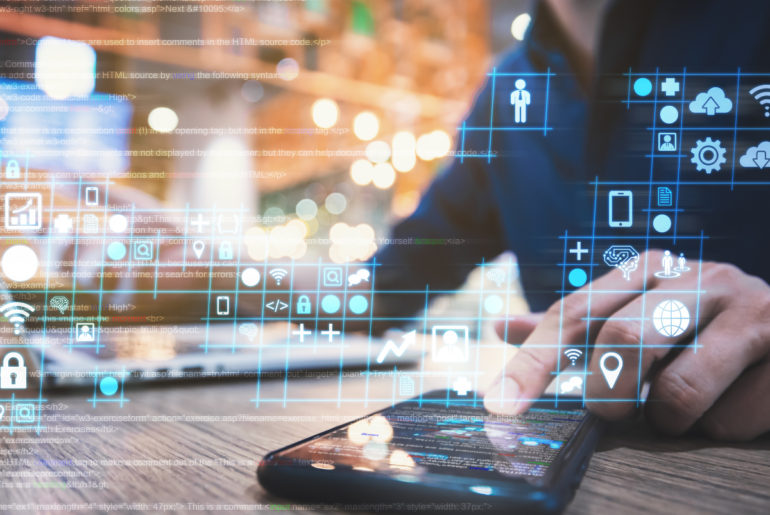 Futuristic image of a hand touching a cell phone screen