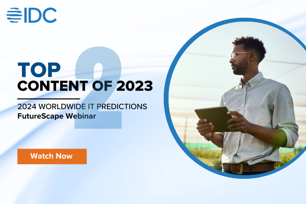 Top 10 content 2023 content 2. FutureScape WW IT Predictions. Man holding tablet looking out over field.