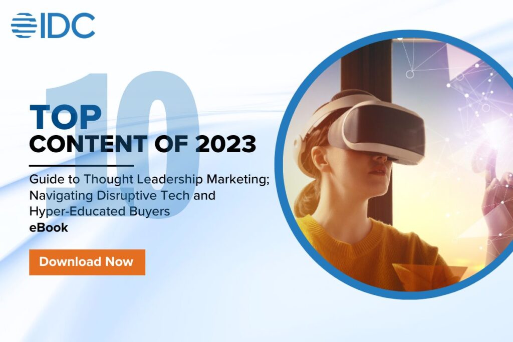 Top 10 content 2023 content 10. Guide to Thought Leadership Marketing; Navigating Disruptive Tech and Hyper-Educated Buyers eBook. Woman with VR headset looking at abstract shapes.