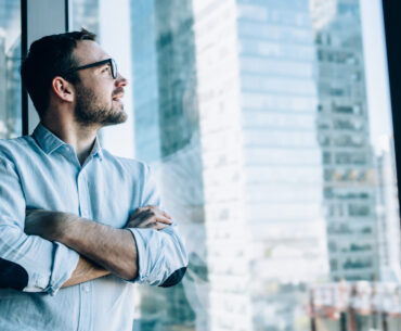 Man looking out of a window